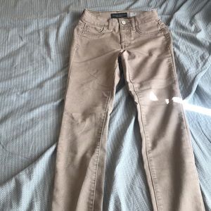 Khaki colored high waisted jegging
